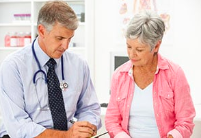 image of woman speaking to her doctor about vertigo